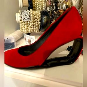 Red suede wedge heel. Really comfortable.